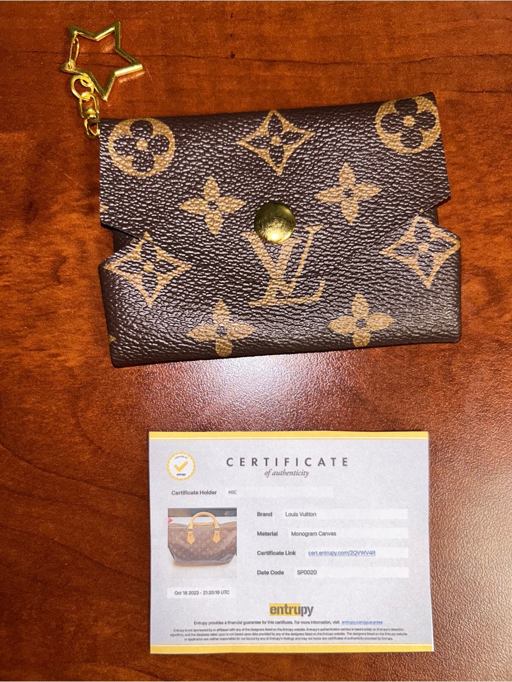 Louis Vuitton Monogram Canvas Brown and Gold Key Pouch with Star Charm